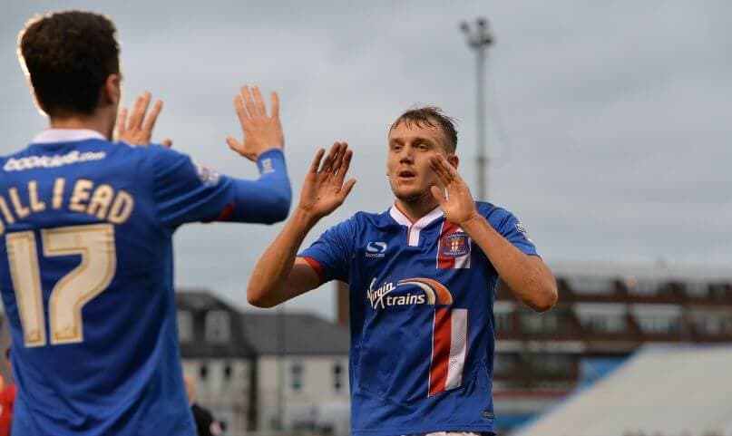 Carlisle United football match atmosphere